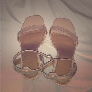 Nude strappy heels